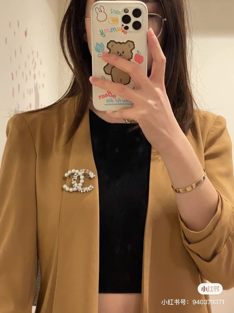 Ch**el brooches
